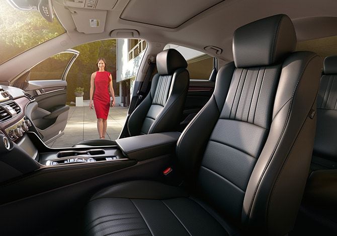 Luxury sedan interior with comfortable black seats and spacious cabin