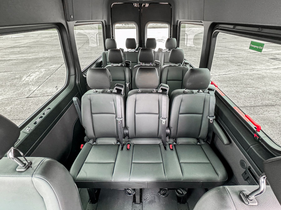 Mercedes Sprinter van flexible seating with captain's chairs arranged for group travel