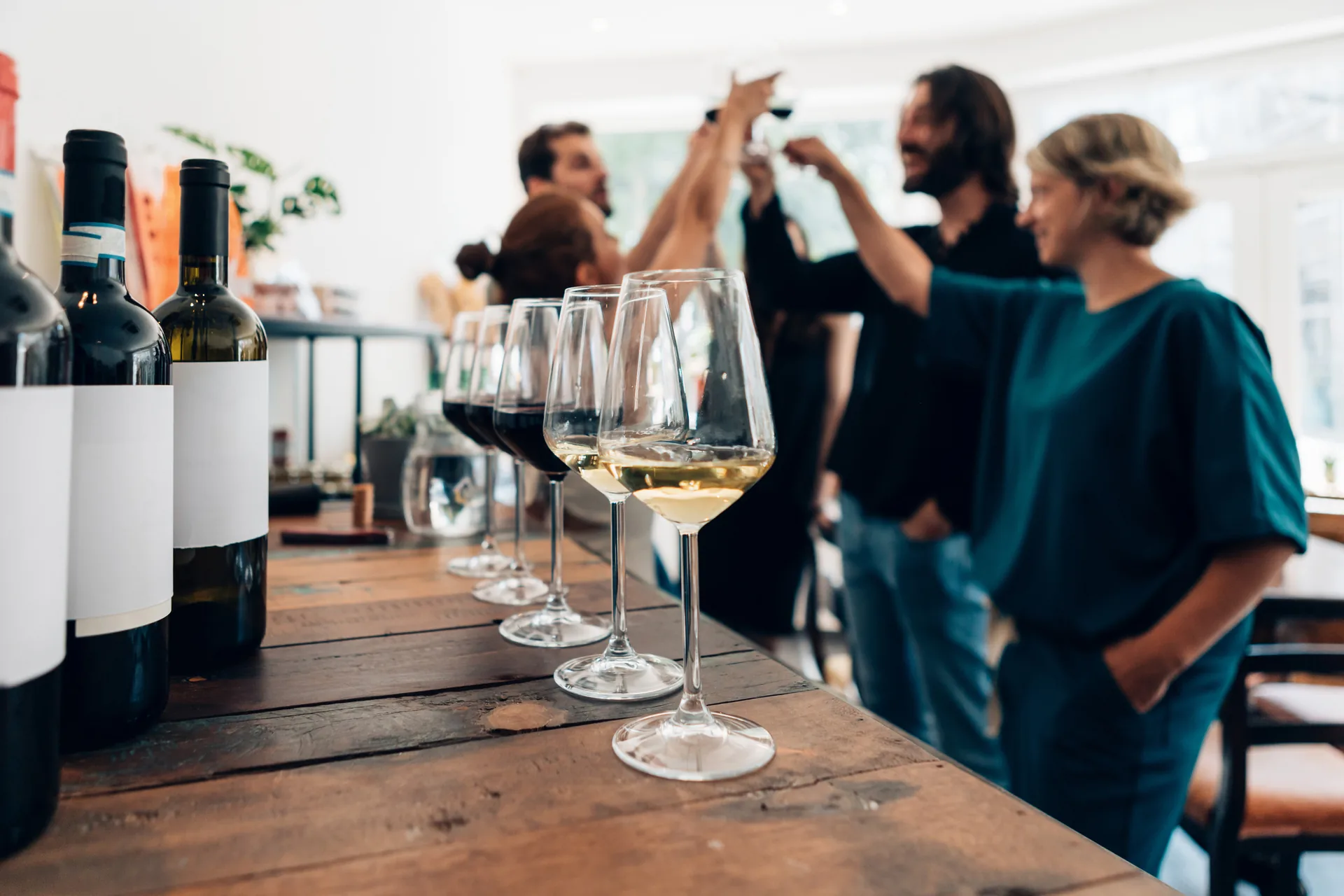 Wine tasting scene featuring wine bottles and glasses showcasing premium Napa Valley wine experience