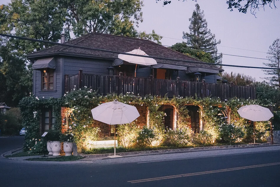 Elegant fine dining table setting at a Napa Valley restaurant with candlelight and wine glasses