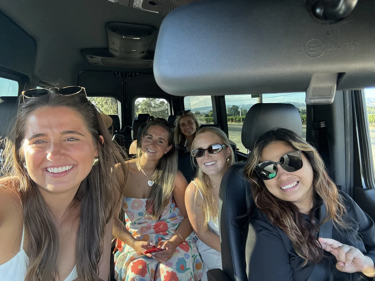 Group of women enjoying a wine tour in Napa Valley with Ride Eaze